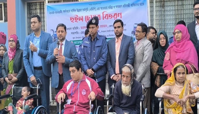 নকলায় প্রতিবন্ধী ব্যক্তিদের মাঝে হুইল চেয়ার বিতরণ