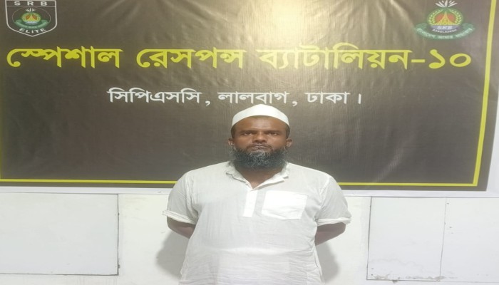 যাবজ্জীবন সা'জা'প্রা'প্ত আ'সা'মি মাসুদ খান (৪৬)’কে ঢাকার কেরাণীগঞ্জ হতে গ্রে'ফ'তা'র করেছে এসআরবি -১০